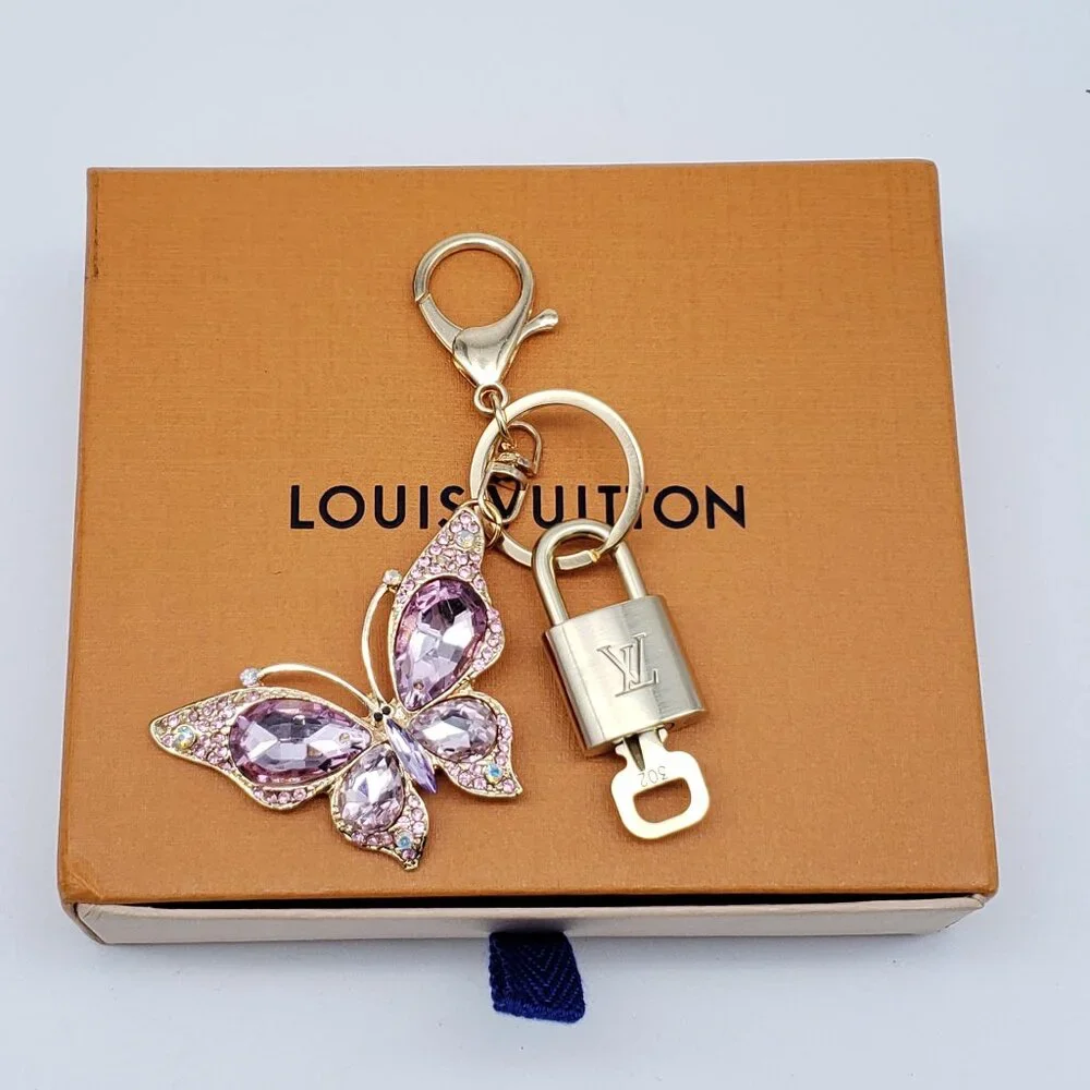 Authentic Louis Vuitton Gold Lock & Box w/ Unbranded Butterfly Bagcharm